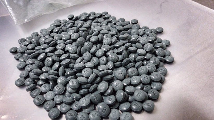 Fentanyl pills are shown in a handout photo. Police say organized crime groups have been sending a potentially deadly drug through British Columbia to Alberta and Saskatchewan using hidden compartments in vehicles. (Alberta Law Enforcement Response Teams/CP)