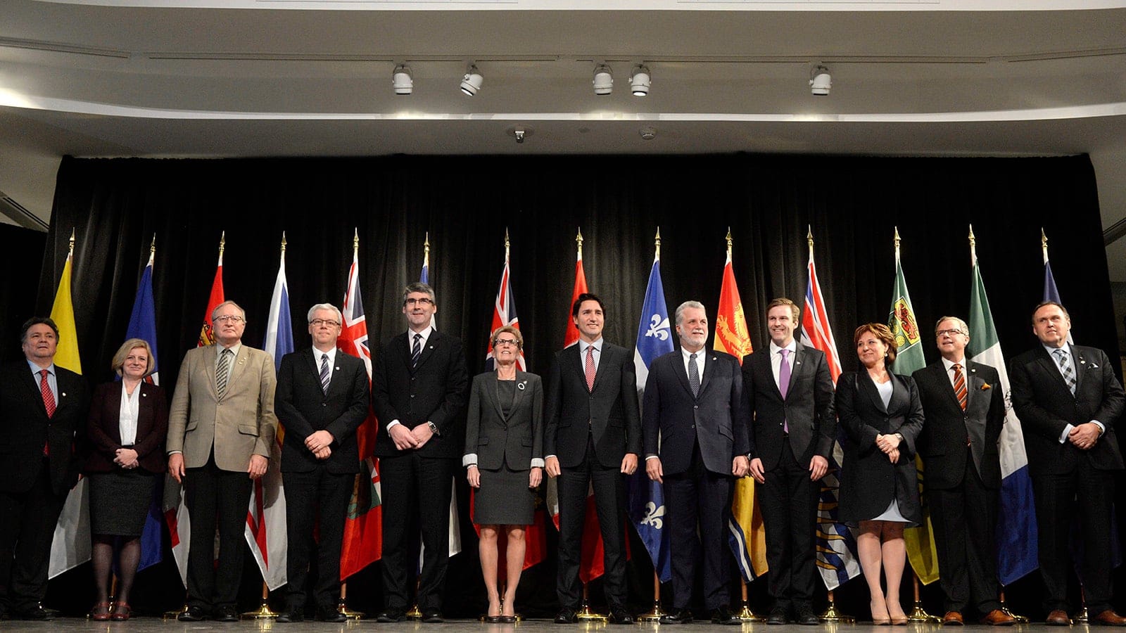 The premiers of the provinces and territories take part in a 'family photo' during a First Ministers meeting at the Canadian Museum of Nature with Prime Minister Justin Trudeau in Ottawa, on Monday, Nov. 23, 2015. (Adrian Wyld/CP)