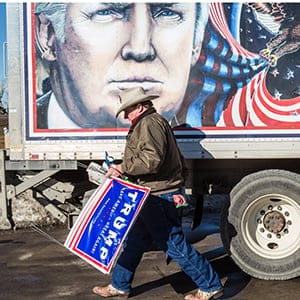 Kraig Moss, a supporter of Republican presidential candidate Donald Trump, outside a truck with a Trump painting in which he is touring Iowa on January 28, 2016 in Des Moines, Iowa. (Brendan Hoffman/Getty Images)