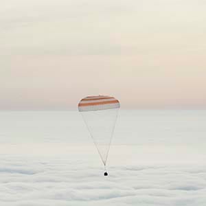 In this handout provided by NASA, The Soyuz TMA-18M spacecraft is seen as it lands with Expedition 46 Commander Scott Kelly of NASA and Russian cosmonauts Mikhail Kornienko and Sergey Volkov of Roscosmos on March 2, 2016 near the town of Zhezkazgan, Kazakhstan. Kelly and Kornienko completed an International Space Station record year-long mission to collect valuable data on the effect of long duration weightlessness on the human body that will be used to formulate a human mission to Mars. Volkov returned after spending six months on the station. (Bill Ingalls/NASA/Getty Images)