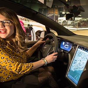 A visitor at the 2016 Canadian International Auto Show. (Bruce Reeve/CBC)