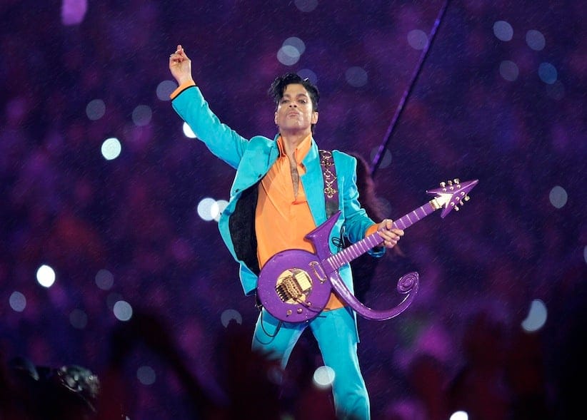 FILE - In this Feb. 4, 2007 file photo, Prince performs during the halftime show at the Super Bowl XLI football game at Dolphin Stadium in Miami. The halftime show has become one of the year's top cultural moments, so anticipated that it is commonly seen by more people than the game itself. (AP Photo/Chris O'Meara, File)