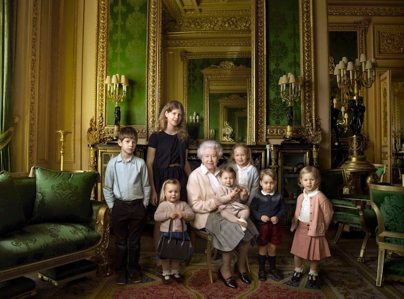 This official photograph, released by Buckingham Palace on Wednesday April 20, 2016, to mark her 90th birthday, shows Queen Elizabeth II with her five great-grandchildren and her two youngest grandchildren in the Green Drawing Room, part of Windsor Castle's semi-State apartments in Windsor England. (© 2016 Annie Leibovitz via AP) MANDATORY CREDIT