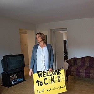 Rachael Tabor, left, and Deborah Woolway, waiting in the vacant apartment they have for the Syrian Refugee family they have sponsoured. (Photograph by Darren Calabrese)