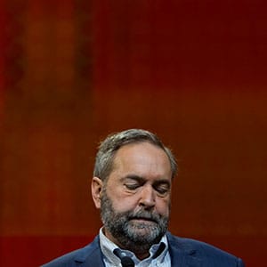 NDP Party Leader Thomas Mulcair addresses the delegates during the 2016 NDP Federal Convention in Edmonton, Alberta on Sunday, April 10, 2016. Members of the party voted down his bid to continue in the leadership, voting 52% in favour of choosing a replacement within the next two years. (Photograph by Amber Bracken)