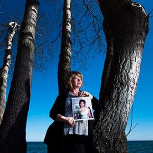 Donna May holds a photograph of her late daughter Jac. Jac died in 2012 after overdosing on pain medication prescribed to help her cope with a flesh-eating disease she'd contracted after years of addiction and life on the streets. Nearly four years after her daughter died of an opioid overdose, May will share her story of loss and learning at the United Nations. (Nathan Denette/CP)