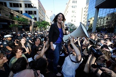 Naomi Klein spoke in front of an estimated 3,000 people in front of Toronto Police Headquarters who rallied in solidarity against police arrests made over the weekend during the G20 Summit in Toronto. (Lucas Oleniuk/Toronto Star/Getty Images)
