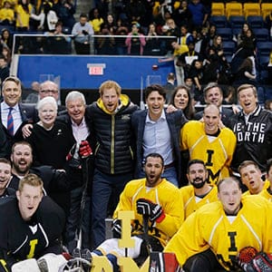 Britain's Prince Harry, Canada's Prime Minister Justin Trudeau and Toronto Mayor John Tory pose with officials and sledge hockey players during the Invictus Games media launch in Toronto, Ontario, Canada, May 2, 2016. (Mark Blinch/Reuters)