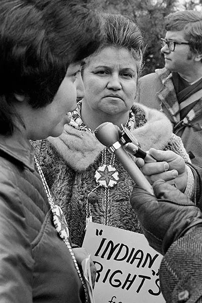 Jenny Margetts (left) of Edmonton, and Monica Turner of Geraldton, Ontario, co-spokespersons for an Indian Rights for Indian Women's group, speak to reporters in front of the Parliament Buildings on February 21, 1973, protesting what they consider the Indian Act's discrimination against women. The Act forces Indian women to give up their status as treaty Indians when they marry whites or non-treaty Indians. (Bill Brennan/CP)