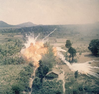 American napalm bombs exploding in fields south of Saigon during the Vietnam war. Napalm kills by asphyxiation and burning and was first used by the US against Japan in WW II. (Hulton Archive/Getty Images)