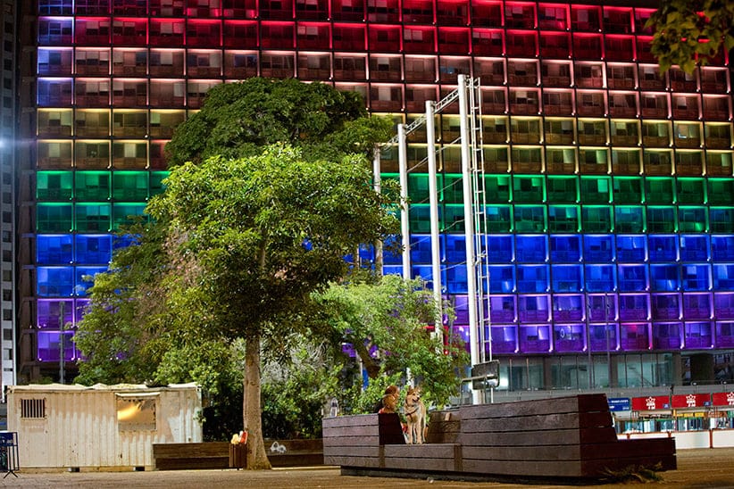 Tel-Aviv city hall lit up with rainbow flag colors in solidarity with Florida's shooting attack victims, in Tel Aviv, Israel, Sunday, June 12, 2016. The shooting attack in Orlando, Florida, USA, Sunday, left more than 50 people dead amid a multitude of events celebrating LGBT Pride Month. (Oded Balilty/AP)