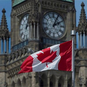 The Maple Leaf flies in front of the Peace tower on Parliament Hill. (Adrian Wyld/CP)