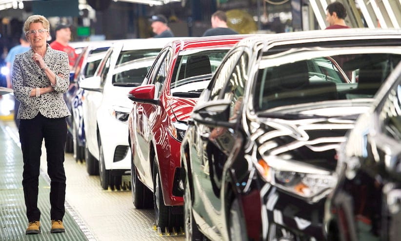 Ontario Premier Kathleen Wynne tours the Toyota Motor Manufacturing Canada assembly plant during a campaign stop in Cambridge, Ont., on Tuesday, May 21, 2014. THE CANADIAN PRESS/Nathan Denette