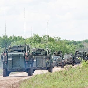 Canadian military vehicles line up for a convoy during Exercise MAPLE RESOLVE at Wainwright, Alberta on June 1, 2016. (Master Corporal Precious Carandang/4th Canadian Division Public Affairs)