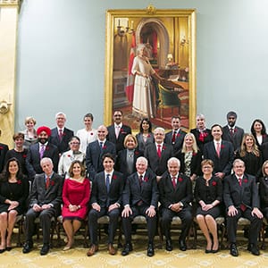 OTTAWA, Nov. 4, 2015 -- Newly elected Canadian Prime Minister Justin Trudeau, fifth left first row, takes a group photo with his cabinet ministers at Rideau Hall in Ottawa, Canada, Nov. 4, 2015. Justin Trudeau was sworn in as Canada's 23rd prime minister and named a 31-member cabinet here Wednesday. (Chris Roussakis/Xinhua News Agency/Getty Images)
