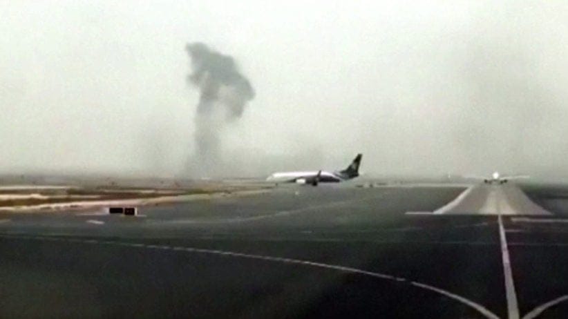 This image made from video shows this image made from video shows smoke rising after an Emirates flight crash landed at Dubai International Airport on Wednesday, Aug. 3, 2016. (Hayen Ayari via AP) rising after an Emirates flight crash landed at Dubai International Airport on Wednesday, Aug. 3, 2016. The plane at right was unaffected Dubai-based airline Emirates has confirmed that there were no fatalities on a flight from India that crash-landed . (Hayen Ayari via AP)