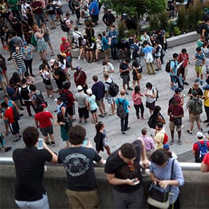 Gamers use their phones during the Pokemon Go release party in Toronto on Monday, July 18, 2016. Sunday marked the official release of the "augmented reality" mobile Pokemon game in Canada. (Cole Burston/CP)