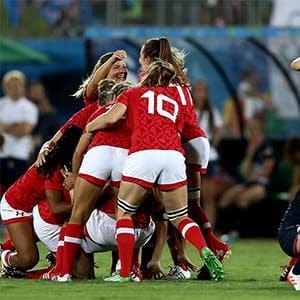 Team Canada celebrates their victory winning the Bronze medal after the Women's Bronze Medal Rugby Sevens match between Canada and Great Britain on Day 3 of the Rio 2016 Olympic Games at the Deodoro Stadium on August 8, 2016 in Rio de Janeiro, Brazil. (David Rogers/Getty Images)