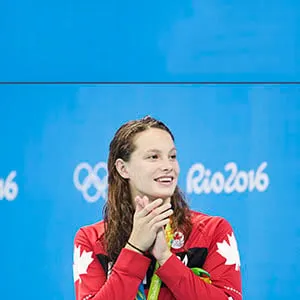 Canada's Penny Oleksiak shows her appreciation after winning a silver medal in the women's 100m butterfly at the 2016 Summer Olympic in Rio de Janeiro, Brazil. (Lucas Oleniuk/Toronto Star/Getty Images)