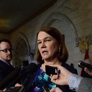 Minister of Health Jane Philpott and International Development Minister Marie-Claude Bibeau speak to reporters in the House of Commons foyer on Parliament Hill in Ottawa on Wednesday, May 11, 2016, regarding investments in the global fight against the Zika virus. (Sean Kilpatrick/CP)