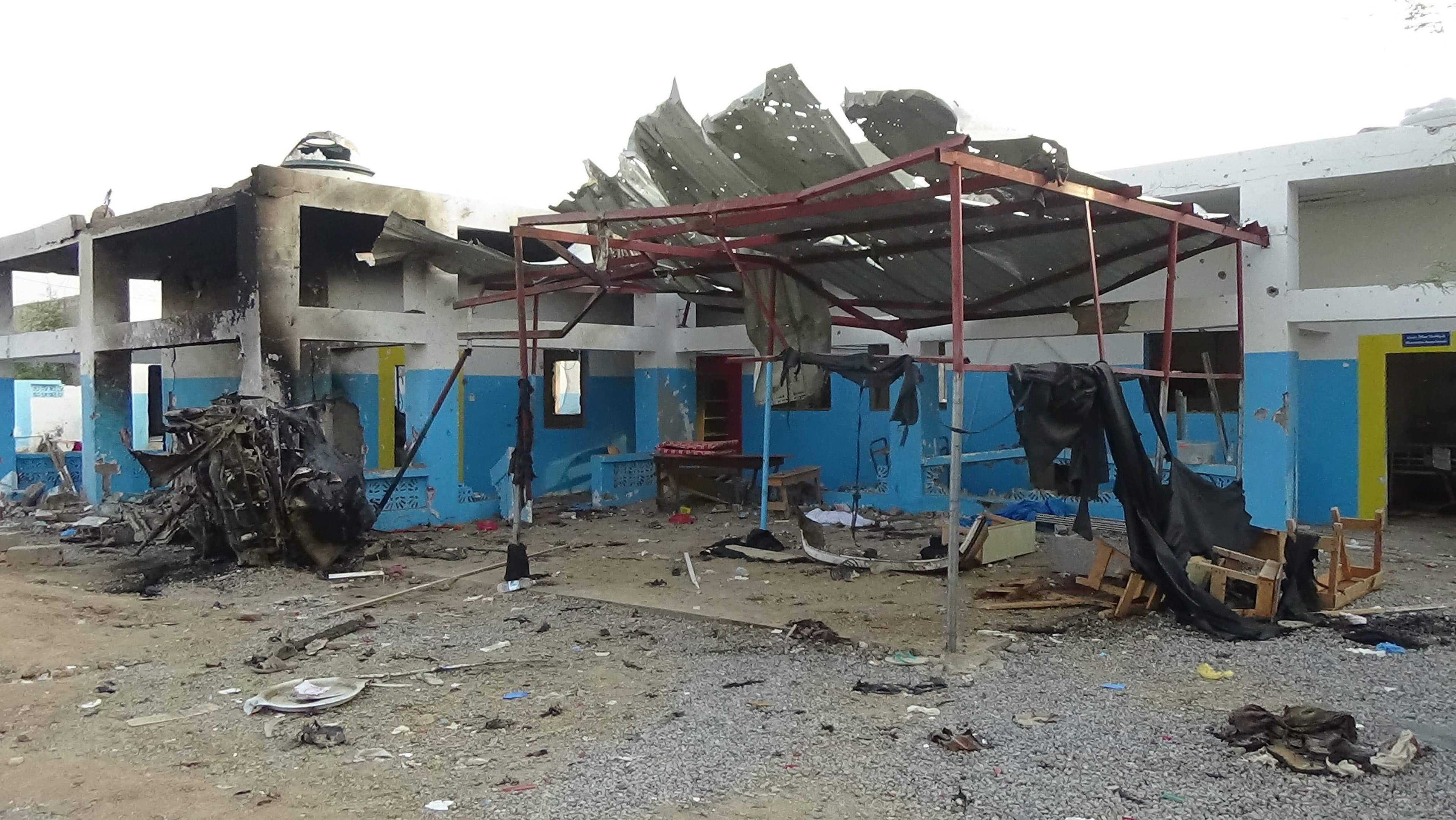 A hospital supported by Doctors Without Borders is seen after was hit by a Saudi-led airstrike in the northern town of Abs, Yemen, Tuesday, Aug.16, 2016. Yemen's Houthi rebels condemned the Saudi-led military coalition on Tuesday over an airstrike that hit a hospital, killing several people. (AP Photo)