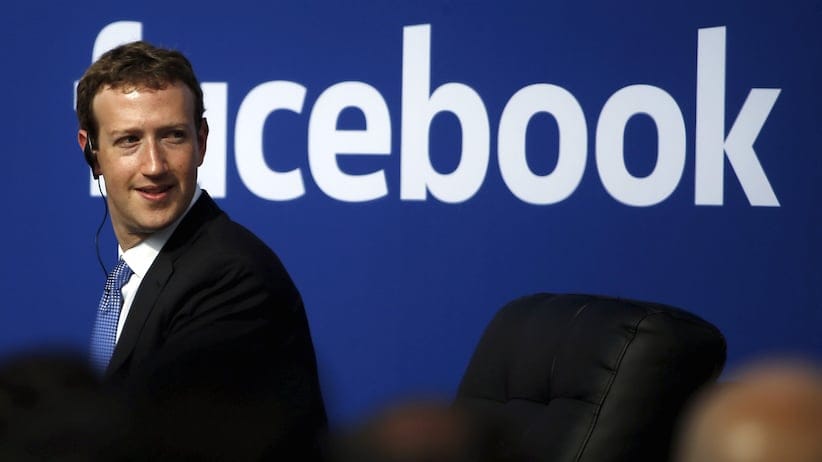 Facebook CEO Mark Zuckerberg is seen on stage during a town hall at Facebook's headquarters in Menlo Park, California September 27, 2015. REUTERS/Stephen Lam/File Photo