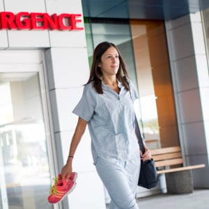 Tara Riddell, first-year resident at McMaster University, leaves the McMaster University Medical Centre. (Photograph by Nick Iwanyshyn)