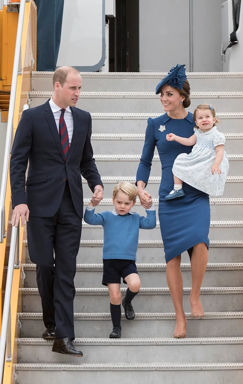 Prince William, Duke of Cambridge, Catherine, Duchess of Cambridge, Prince George of Cambridge and Princess Charlotte of Cambridge arrive at Victoria International Airport on September 24, 2016 in Victoria, Canada. (Christopher Morris/Hello)