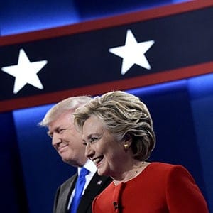 Republican presidential nominee Donald Trump(L) and Democratic presidential nominee Hillary Clinton arrive on stage for the first presidential debate at Hofstra University in Hempstead, New York on September 26, 2016. (Mandel Ngan/AFP/Getty Images)