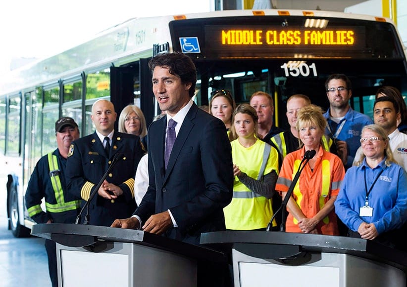 Prime Minister Justin Trudeau makes an announcement with Ontario Premier Kathleen Wynne, not shown, regarding new funding for transit in Barrie, Ont., on Tuesday, August 23, 2016. (Nathan Denette/CP)