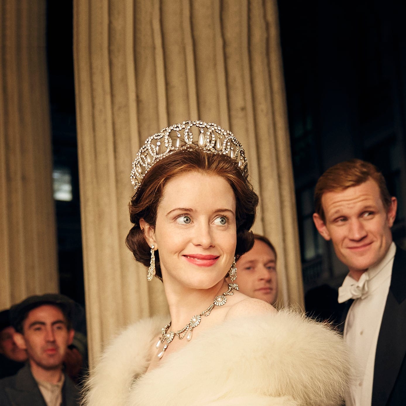 Claire Foy, centre, and Matt Smith are seen in a still image from The Crown. (Robert Viglasky/Netflix)