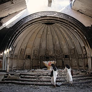 Nuns from the Syriac Catholic Dominican Sisters of Saint Catherine of Sienna visit churches in the predominantly Christian town of Qaraqosh for the first time in more than two years. Islamic State has wreaked havoc in towns and villages during its retreat in northern Iraq. (Photograph by Adnan R. Khan)