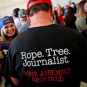 A man wears a shirt reading "Rope. Tree. Journalist." as supporters gather to rally with Republican presidential nominee Donald Trump in a cargo hangar at Minneapolis Saint Paul International Airport in Minneapolis, Minnesota, U.S. November 6, 2016. (Jonathan Ernst/Reuters)