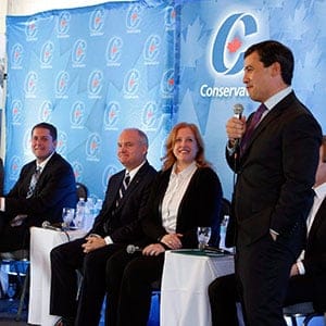From left to right, Chris Alexander, Maxime Bernier, Andrew Scheer, Erin O'Toole and Lisa Rait look on as Conservative leadership candidate Michael Chong responds to questions from the audience at a Conservative leadership debate in Greely, Ont., on Sunday, November 13, 2016. (Fred Chartrand/CP)