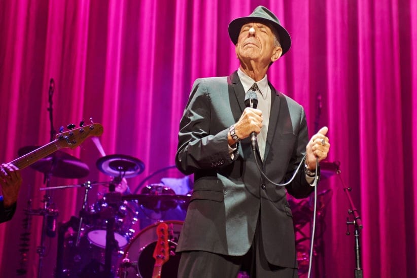 Leonard Cohen performs on stage at Leeds Arena in Leeds, England. (Gary Wolstenholme/Redferns/Getty Images)