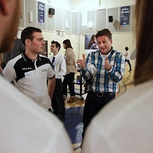 Peter Widdis, a professor in the Centre for Business, Arts and Design gives advice to Stephen Tyson and his team called Kloud Nine Entertainment, a group of students presenting to a panel of industry professionals at the George Brown Exam Jam. (Anne-Marie Jackson/Toronto Star/Getty Images)