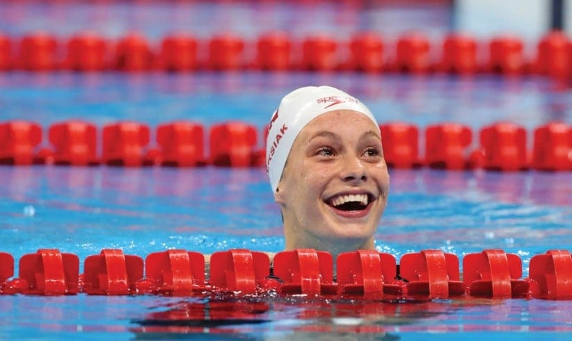 August 12, 2016: After catching her breath, Canada's Penny Oleksiak realizes she's won gold in the 100-m freestyle in Rio de Janeiro. (Lee Jin-man/AP/CP)