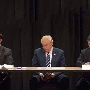 Donald Trump is interrupted by a phone call during a meeting with specialists on the problem of opiate addiction, after a campaign event in Manchester, N.H., Oct. 28, 2016. Trump on Friday seized on the FBI's announcement that it had uncovered new emails related to the investigation into whether Hillary Clinton had mishandled classified information. (Stephen Crowley/The New York Times/Redux)