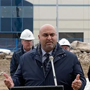 Rathore at the groundbreaking ceremony for a hotel and condo project in Regina.