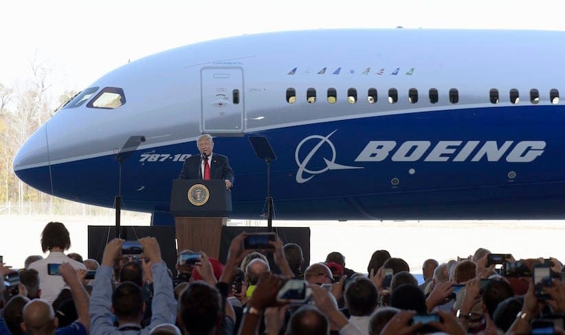 President Donald Trump speaks in front of the Boeing 787 Dreamliner while visiting the Boeing South Carolina facility in North Charleston, S.C., Friday, Feb. 17, 2017. Trump visited the plant before heading to his Mar-a-Lago estate in Palm Beach, Fla. for the weekend. (AP Photo/Susan Walsh)