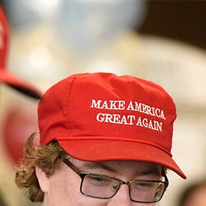 Alex Walsh, right, and Matt Atkins wear Make America Great Again hats as they attend the Manning Centre conference on Friday, Feb. 24, 2017 in Ottawa. (Justin Tang/CP)