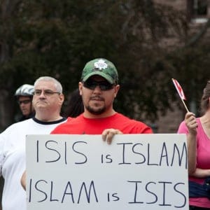 Protesters demonstrate during a Pegida Canada rally at Queens Park in Toronto, Canada on September 19, 2015. Pegida Canada is an organization that aims to stop the Islamization of the west. (Reynaldo Vasconcelos/CP)
