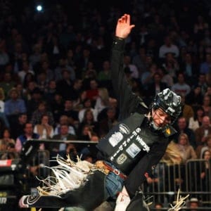 Cowboy Ty Pozzobon rides the bull Exotic Justin during the Professional Bull Riders (PBR) Madison Square Garden Invitational in New York, January 7, 2012. (Eduardo Munoz/Reuters)
