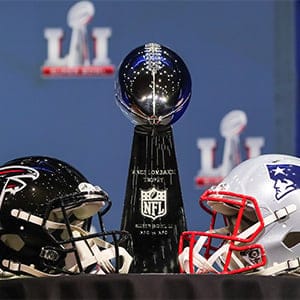 The Vince Lombardi Tophy and Atlanta Falcons helmet and New England Patriots helmet on display during NFL Commissioner Roger Goodell's press Conference on Feburary 01, 2017, at the George R Brown Convention Center in Houston, TX. (Rich Graessle/Icon Sportswire/Getty Images)