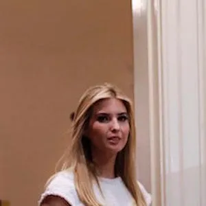 President Donald Trump talks with Kristen Short, as his daughter Ivanka Trump, left, arrives for a meeting on domestic and international human trafficking, Thursday, Feb. 23, 2017, in the Roosevelt Room of the White House in Washington. (AP Photo/Pablo Martinez Monsivais)