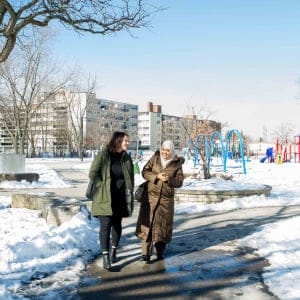 Thorncliffe Park Women's Committee chair Sabina Ali and second yr UofT urban planning student Stephanine Cirnu discuss change and improvent possibilities on community developments in the RV Burgess park in Toronto, ON. (Photograph by Cole Garside)