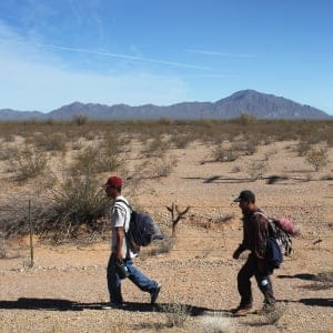 Undocumented Mexican immigrants walk through the Sonoran Desert after illegally crossing the U.S.-Mexico border border on January 19, 2011 into the Tohono O'odham Nation, Arizona. The immigrants said they had wandered the desert lost for a week after crossing from Mexico into the vast Indian reservation at night. Exhausted, they requested the Border Patrol to pick them up and take them to the U.S.-Mexico border, from where they would return to their homes in the Mexican state of Sonora. They had come, they said, to reach Phoenix and find work in construction or landscaping. All said they had worked in Arizona before. (John Moore/Getty Images)