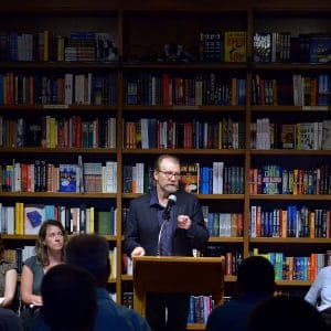 Author George Saunders, reads from his new book "Lincoln in the Bardo" with the help of (L-R) Cristina Russell, Gaël LeLamer, Viv Evans, Cristina Nosti and Katherine Wakefield at Books and Books on February 19, 2017 in Coral Gables, Florida. (Johnny Louis/FilmMagic/Getty Images)