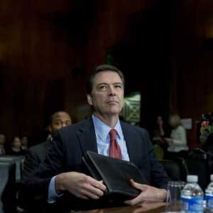James Comey, director of the Federal Bureau of Investigation (FBI), arrives to a Senate Judiciary Committee in Washington, D.C., U.S., on Wednesday, Dec. 9, 2015. The California couple who fatally shot 14 people last week in what authorities are calling a terror attack had become radicalized and discussed martyrdom at least two years ago, Comey said. (Andrew Harre/Bloomberg/Getty Images)