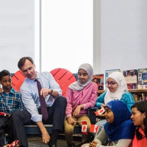 Canada's federal Finance Minister Bill Morneau takes part in the pre-budget ceremony of putting on new shoes at the Nelson Mandela Park Public School in Toronto, Monday March 20, 2017. (Mark Blinch/CP)